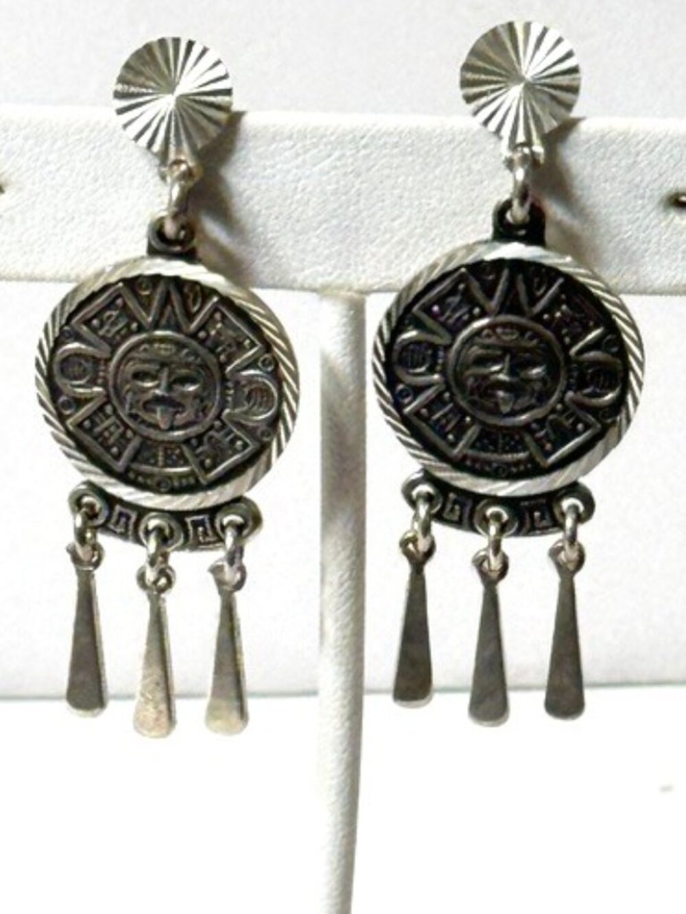 Vintage sterling silver Aztec mask images on small medallion earrings